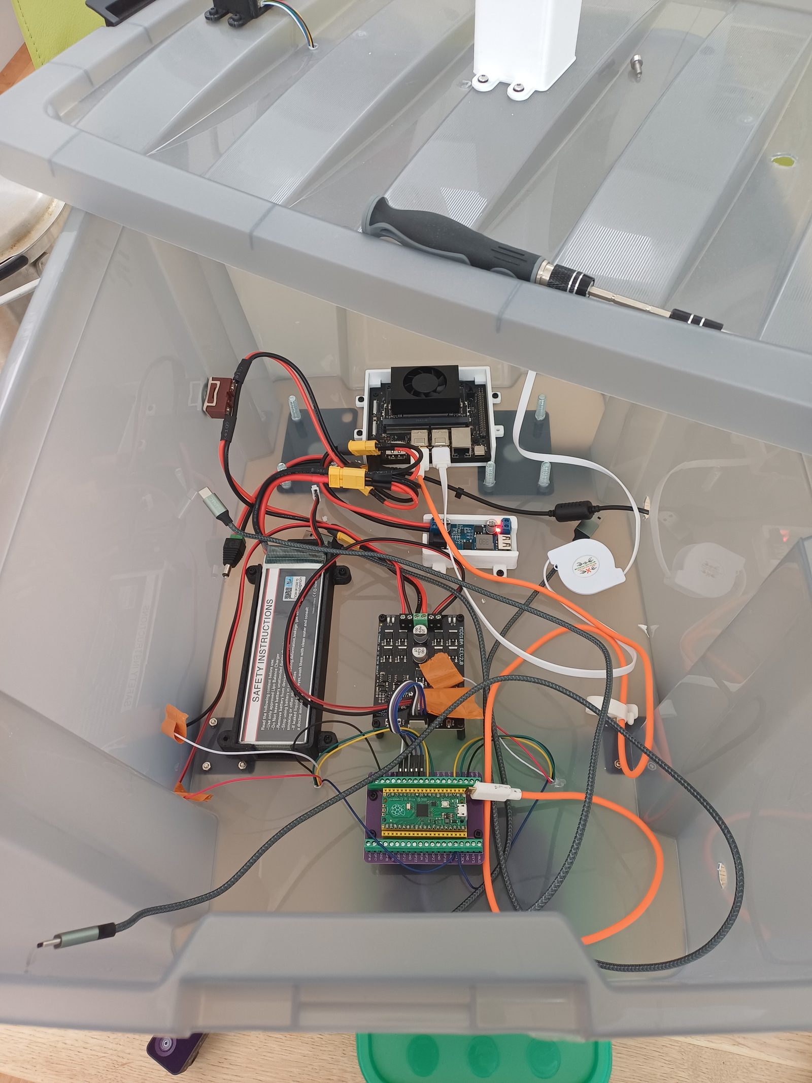 The electronics bay with the Jetson, motor driver and Pico