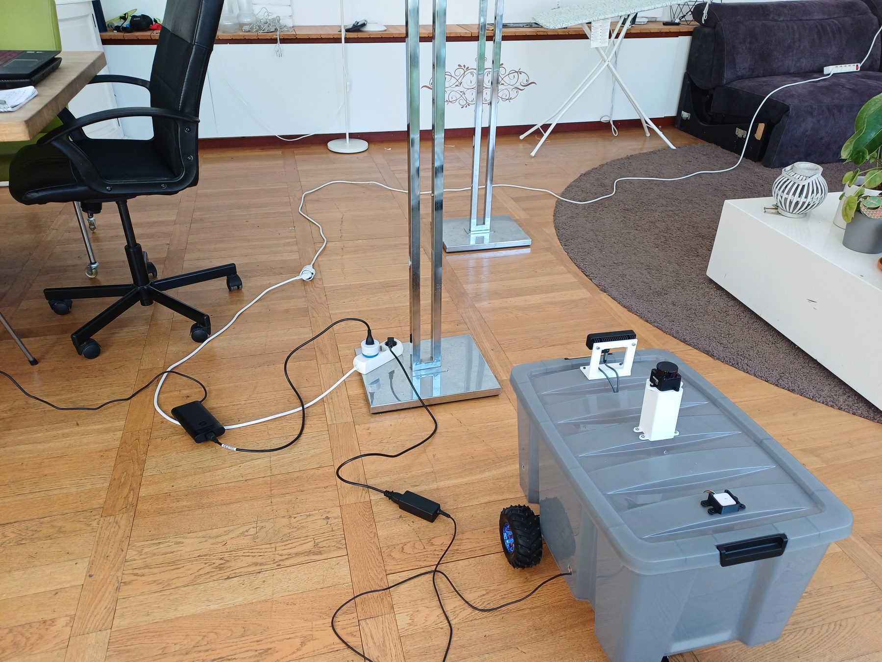 The robot driving across a room